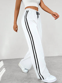 Sanne | Dames sportieve wide-leg broek met zijstrepen en trekkoord