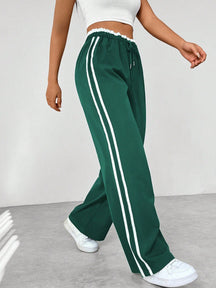 Sanne | Dames sportieve wide-leg broek met zijstrepen en trekkoord
