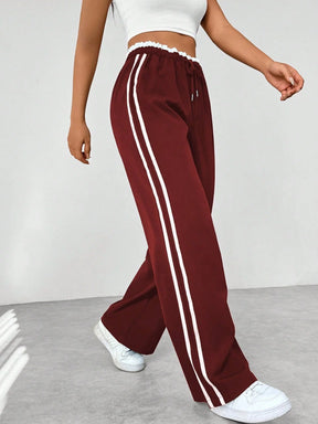 Sanne | Dames sportieve wide-leg broek met zijstrepen en trekkoord